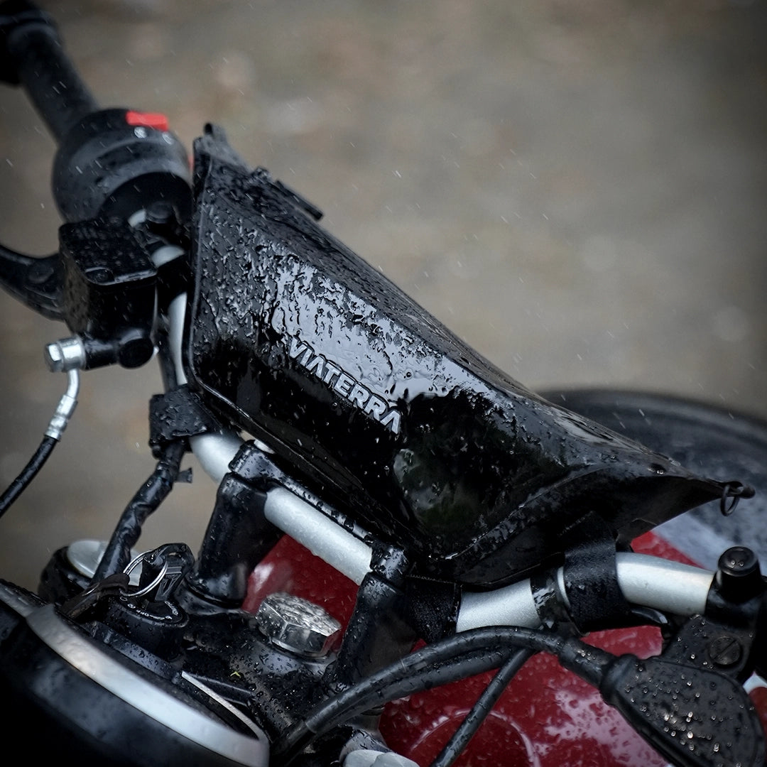 Motorcycle black waterproof handlebar bag for rough rides and adventure trips
